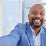 Happy black man, mature or selfie portrait for about us, company profile picture or CEO business in